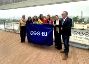UAlg representatives receiving the SEA-EU flag from the President of UBO during the Governing Week in Brest.